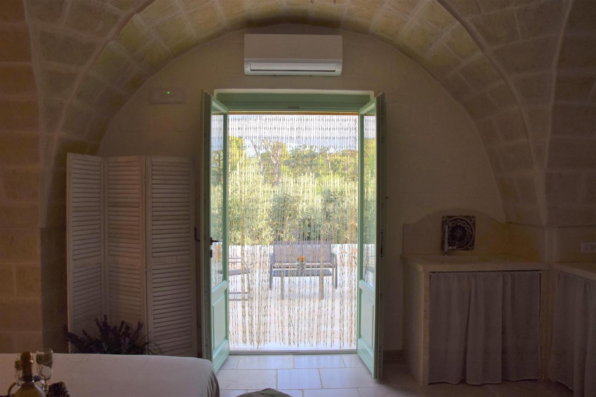 לינה וארוחת בוקר פאסאנו I Trulli Del Tupparello מראה חיצוני תמונה